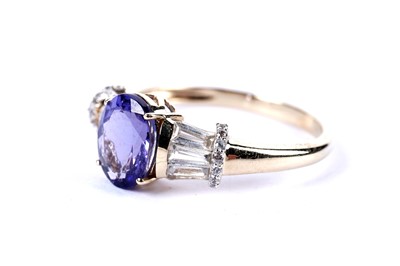 Lot 53 - A tanzanite and white sapphire dress ring