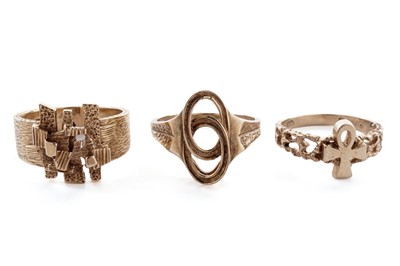 Lot 20 - An Ankh pattern ring; and two other gold rings