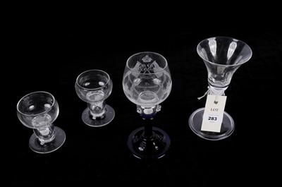 Lot 283 - A collection of commemorative glass ware