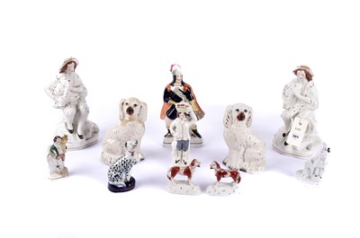 Lot 301 - A collection of 19th Century Staffordshire flatback and other figures