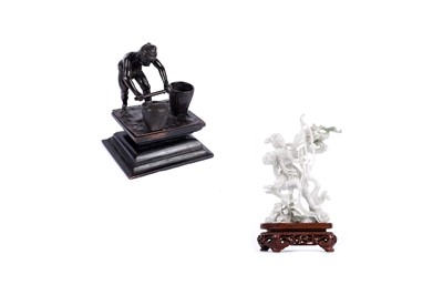 Lot 298 - An Oriental bronze figure; and a 20th Century Chinese pale hardstone figure of an archer