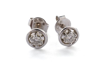 Lot 18 - A pair of diamond stud earrings