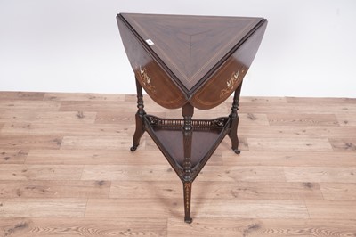 Lot 62 - An Edwardian inlaid rosewood triangular drop leaf occasional table