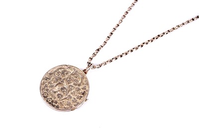 Lot 25 - A rose gold chain necklace and a locket