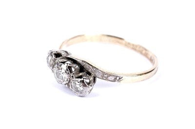 Lot 68 - A diamond three stone ring