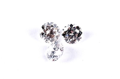 Lot 283 - Three loose round brilliant-cut diamonds