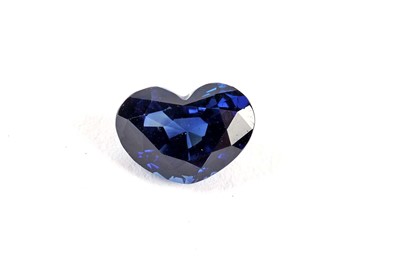 Lot 284 - A loose heart-shaped blue sapphire