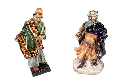 Lot 373 - Two Royal Doulton decorative ceramic figures: 'The Carpet Seller' and 'Good King Wenceslas'