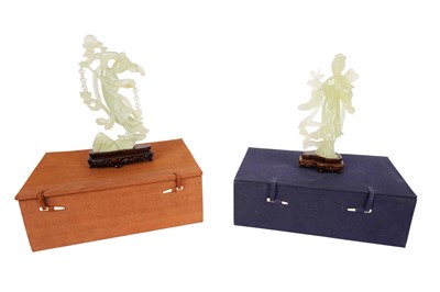 Lot 347 - Two Chinese carved bowenite figures, with hardwood stands and original boxes