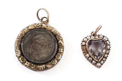 Lot 88 - A Victorian amethyst and seed pearl love heart pendant; and a mourning pendant