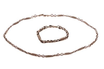 Lot 113 - A rose gold fancy link chain necklace and bracelet