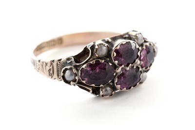 Lot 120 - An Edwardian amethyst and seed pearl ring