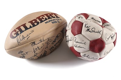 Lot 915 - An autographed rugby ball; together with a signed football