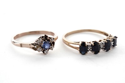 Lot 127 - A four stone sapphire and diamond ring; and another