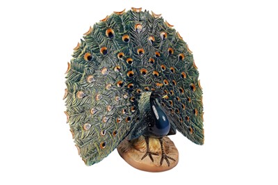 Lot 407 - An Italian decorative ceramic figure of peacock