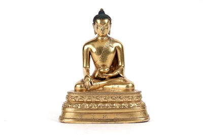 Lot 885 - A Sino-Tibetan gilt bronze figure Shakyamuni