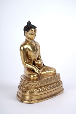 Lot 885 - A Sino-Tibetan gilt bronze figure Shakyamuni