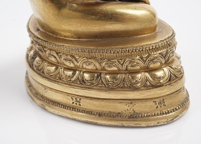 Lot 885 - A Sino-Tibetan gilt bronze figure Shakyamuni