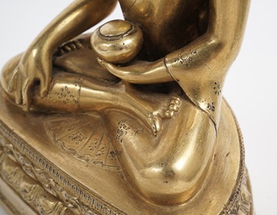 Lot 885 - A Sino-Tibetan gilt bronze figure Shakyamuni