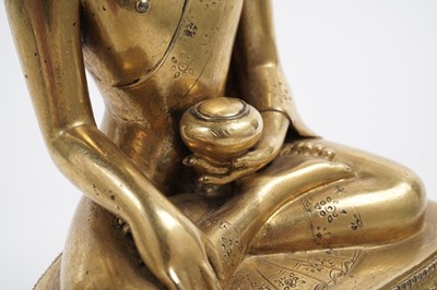 Lot 885 - A Sino-Tibetan gilt bronze figure Shakyamuni