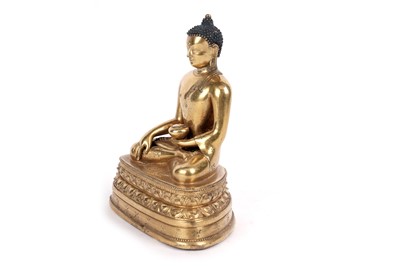 Lot 885 - A Sino-Tibetan gilt bronze figure Shakyamuni