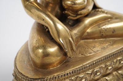 Lot 885 - A Sino-Tibetan gilt bronze figure Shakyamuni