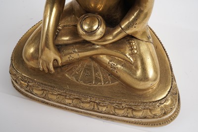 Lot 885 - A Sino-Tibetan gilt bronze figure Shakyamuni