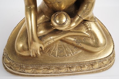 Lot 885 - A Sino-Tibetan gilt bronze figure Shakyamuni