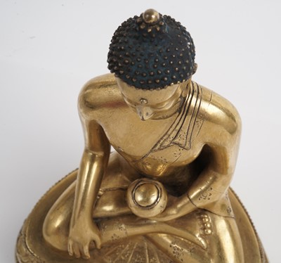 Lot 885 - A Sino-Tibetan gilt bronze figure Shakyamuni