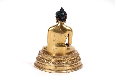 Lot 885 - A Sino-Tibetan gilt bronze figure Shakyamuni