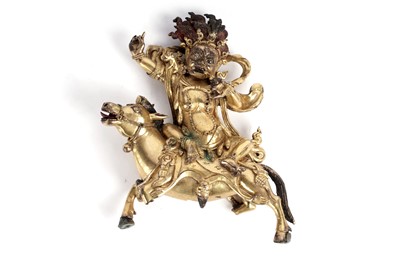 Lot 886 - A Sino-Tibetan gilt bronze figure of the Goddess Palden Lhamo