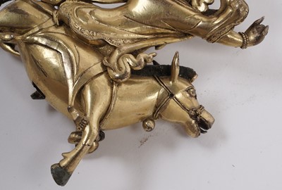 Lot 886 - A Sino-Tibetan gilt bronze figure of the Goddess Palden Lhamo