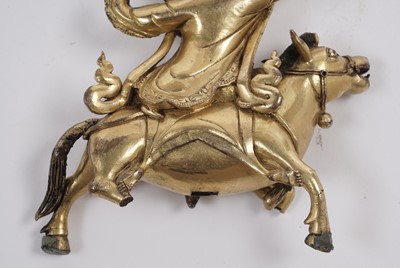 Lot 886 - A Sino-Tibetan gilt bronze figure of the Goddess Palden Lhamo