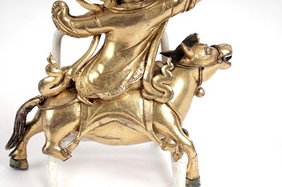 Lot 886 - A Sino-Tibetan gilt bronze figure of the Goddess Palden Lhamo