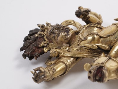 Lot 886 - A Sino-Tibetan gilt bronze figure of the Goddess Palden Lhamo