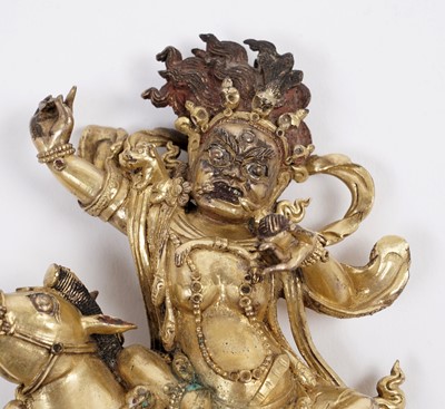 Lot 886 - A Sino-Tibetan gilt bronze figure of the Goddess Palden Lhamo
