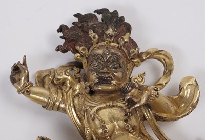 Lot 886 - A Sino-Tibetan gilt bronze figure of the Goddess Palden Lhamo