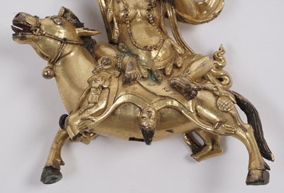 Lot 886 - A Sino-Tibetan gilt bronze figure of the Goddess Palden Lhamo