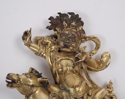 Lot 886 - A Sino-Tibetan gilt bronze figure of the Goddess Palden Lhamo