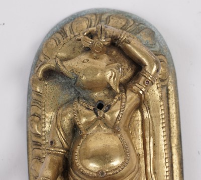 Lot 887 - A Tibetan gilt bronze figure of Ganapati