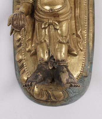 Lot 887 - A Tibetan gilt bronze figure of Ganapati