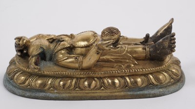 Lot 887 - A Tibetan gilt bronze figure of Ganapati