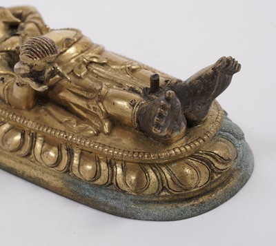 Lot 887 - A Tibetan gilt bronze figure of Ganapati