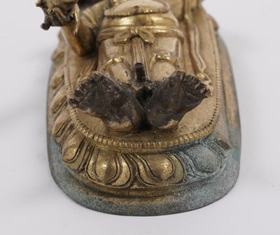 Lot 887 - A Tibetan gilt bronze figure of Ganapati