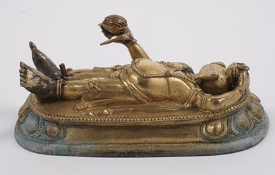 Lot 887 - A Tibetan gilt bronze figure of Ganapati