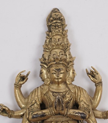 Lot 888 - A Sino-Tibetan gilt bronze figure of Avalokitesvara