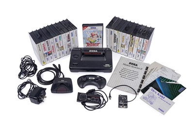 Lot 157 - ﻿A SEGA Master System II; and a selection of SEGA Master System games