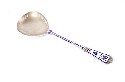 Lot 337 - A Danish silver gilt and enamel serving spoon by Peter Hertz