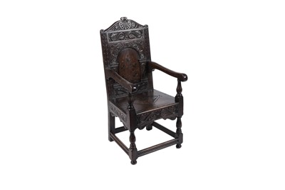 Lot 1469 - A 19th Century Wainscot style carved oak hall chair