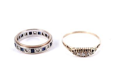 Lot 238 - A diamond five stone ring; and another ring